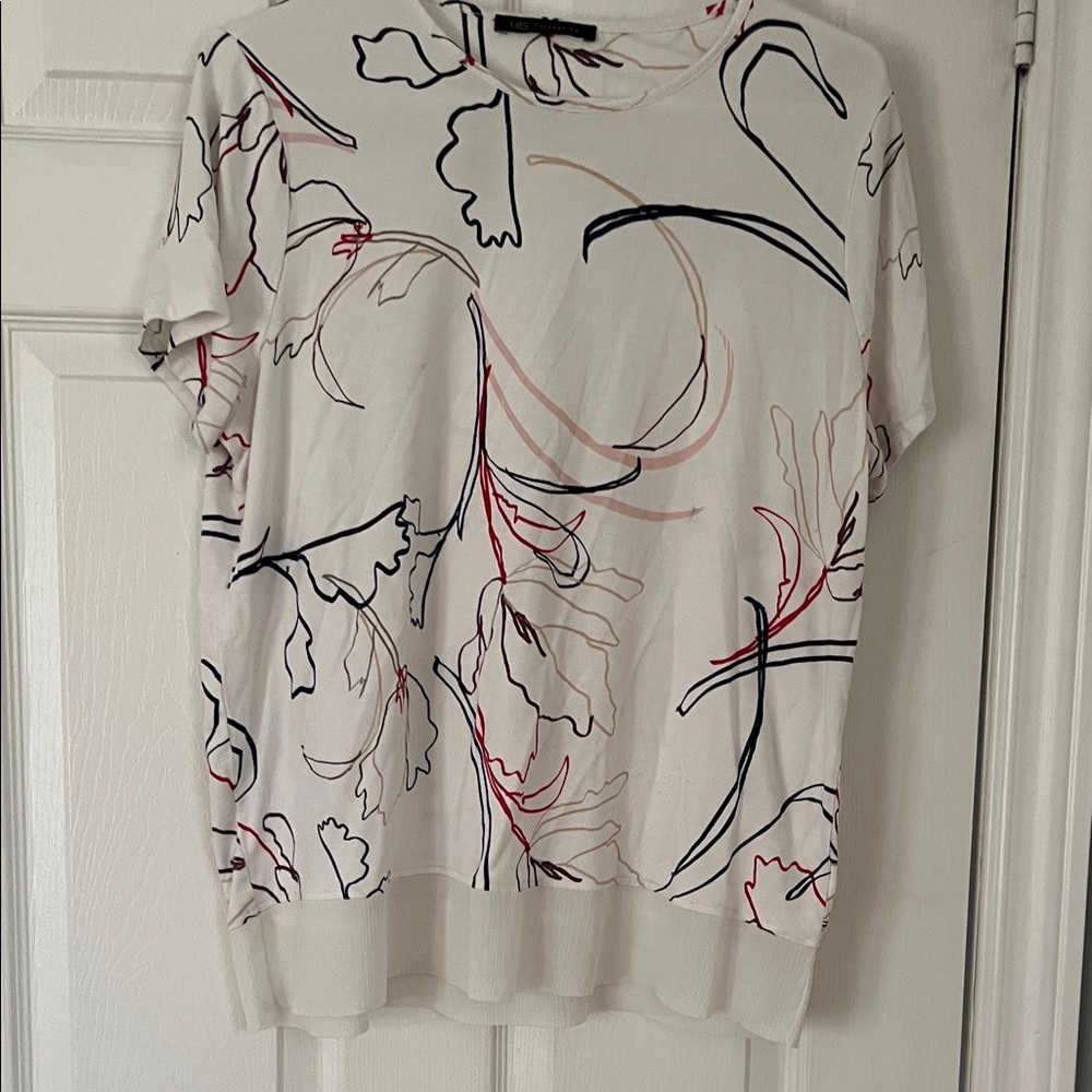 Floral Print White Top /  medium size but it has no tag for size.